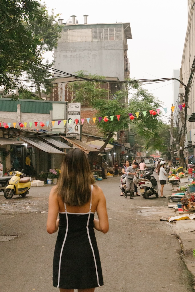 girl in hanoi starting her 7 day north vietnam itinerary around the country