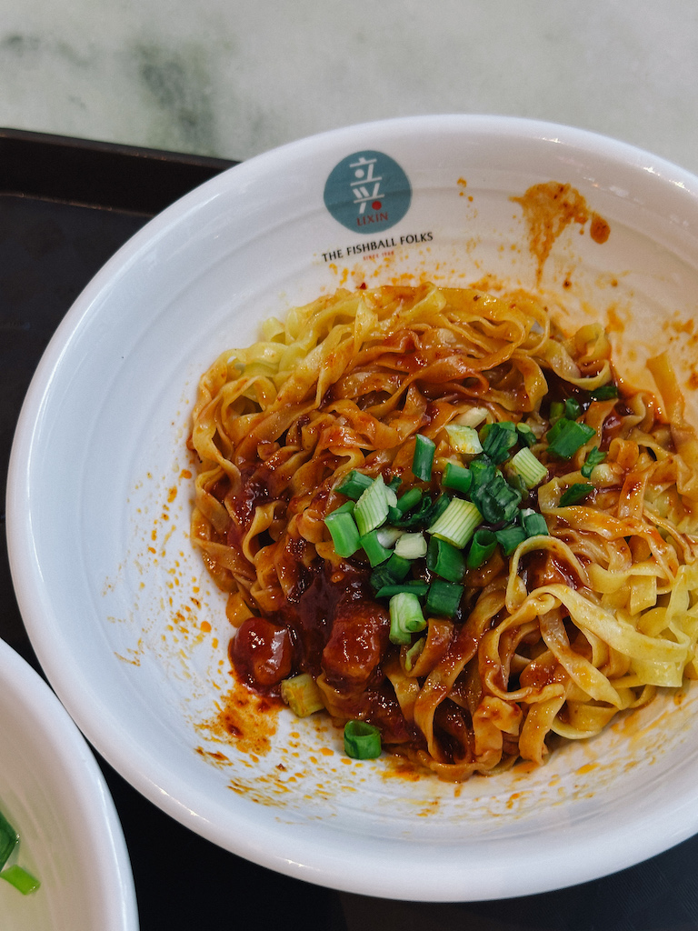 a bowl of delicious fish ball noodles, a singapore staple, top 12 must try food must try dishes in singapore